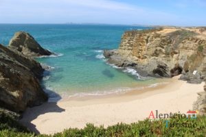 Baía, praia e cabo